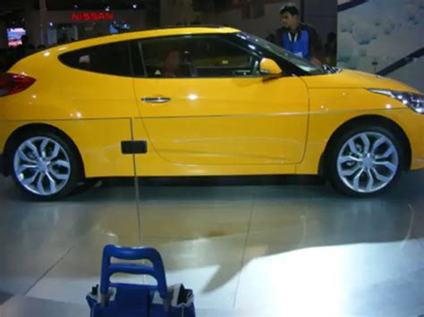 Hyundai unveils three-door utility coupe Veloster - Hyundai unveils ...