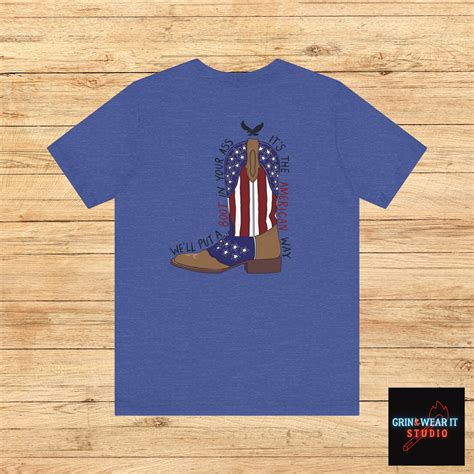 We'll Put A Boot in Your Ass - Toby Keith USA Unisex T-shirt - Courtesy ...