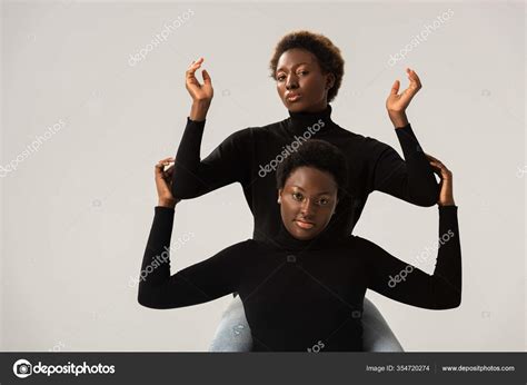 Female African American Friends Black Turtlenecks Gesturing Isolated ...