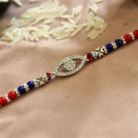 Evil Eye Rakhi Silver – A Modern Symbol of Protection and Love – Gaayu ...