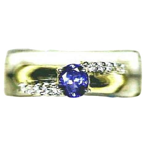 Grand Sample Sale Ring Featuring Blueberry Tanzanite Set in 14k Honey Gold For Sale at 1stDibs