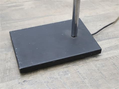 George Nelson | Floor lamp with a perforated shade | MutualArt