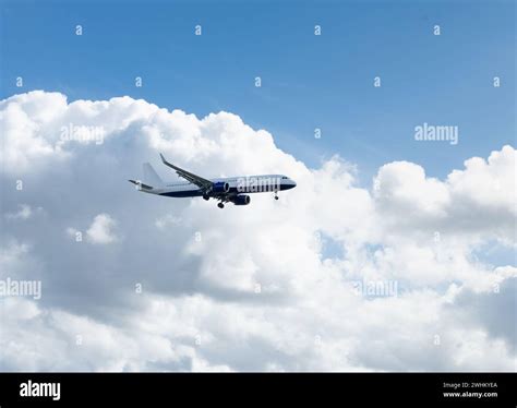 Passenger plane in the sky Stock Photo - Alamy