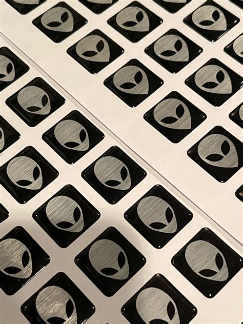 Image result for Alienware Yellow Alien Head On Lid