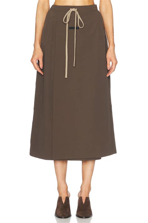 Fear of God ESSENTIALS Military Nylon Wrap Skirt in Brown | FWRD