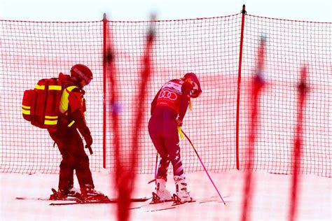 United States' Lindsey Vonn crashes into a gate during an alpine ski women's downhill race, at the 2026 Winter Olympics, in Cortina d'Ampezzo, Italy, Sunday, Feb. 8, 2026. (AP Photo/Jacquelyn Martin)