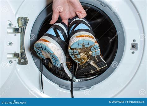 Washing Dirty Sneakers in the Washing Machine. Cleaning Trail Running ...