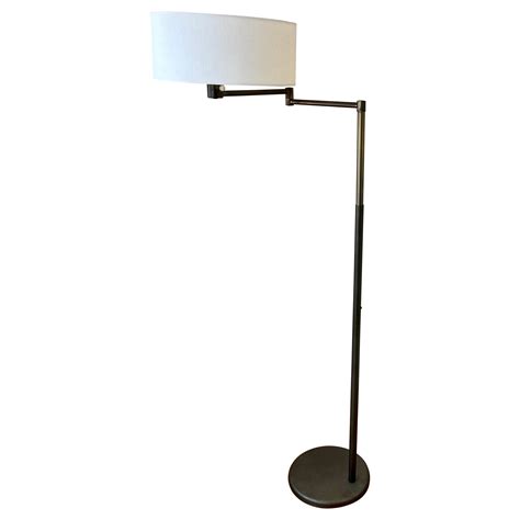 Pair of Nessen Adjustable Swing Arm Floor Lamps at 1stDibs