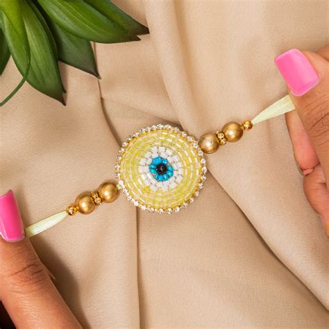 Evil Eye Rakhi Bracelet in Gold - Buy Rakhi Online | The Zappy Box