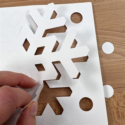 Image result for Snowflake Paper Cut