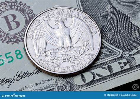 US Coin Quarter Dollar on One Dollar Bill. Stock Photo - Image of bank ...