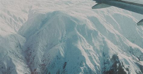 Image result for Plane Flying Over Snow