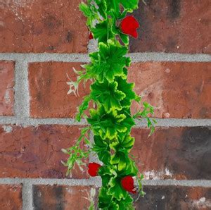 Dynamic Retail Global Artificial Hanging Flowers Plant Wall Hanging ...