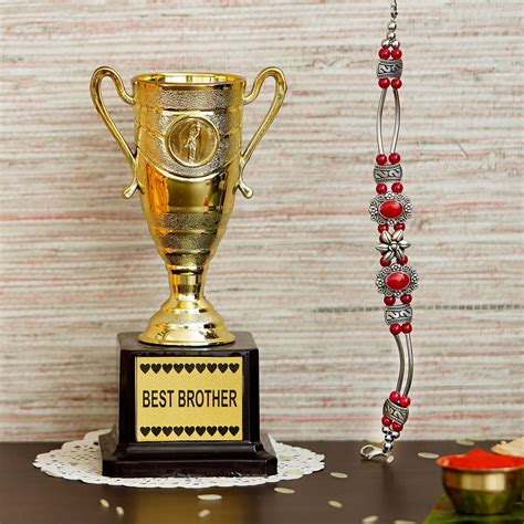 Designer Stone Rakhi with Best Brother Trophy and Roli Chawal Pack ...