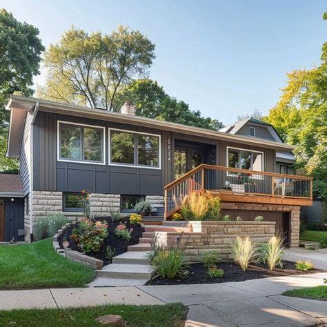 The sleek exterior of a redesigned split-level domicile, incorporating ...