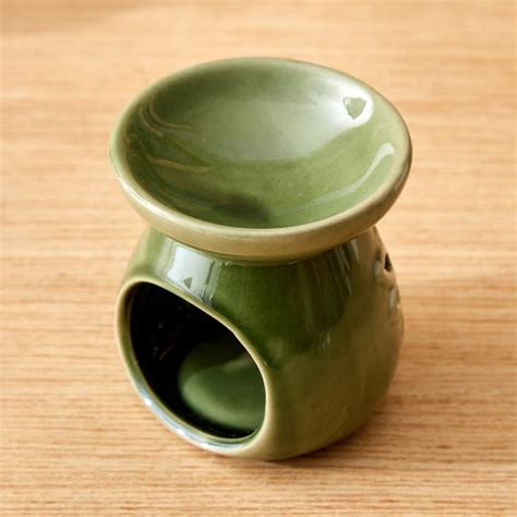 Buy Garnet Serene Ceramic Lotus Burner from Home Centre at just INR 129.0