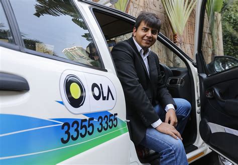 SoftBank-backed Ola Electric suspends India car project to focus on scooters, bikes, sources say ...