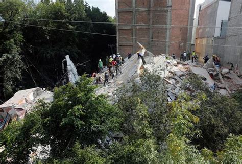 Quiet, listen to faint cries: Mexicans dig in rubble seeking survivors ...