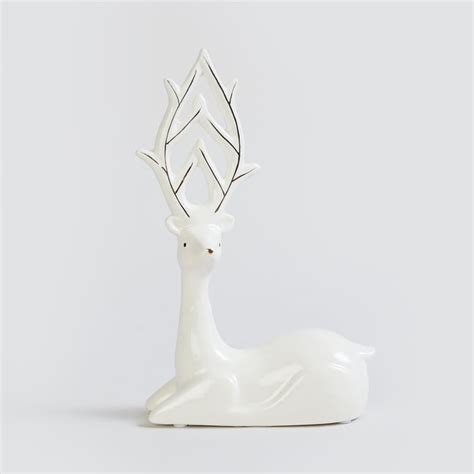 Buy Brighton Ceramic Textured Sitting Reindeer Figurine from Home ...