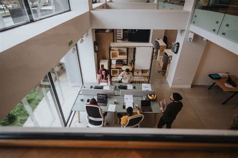 Elevated view of a busy open plan office.