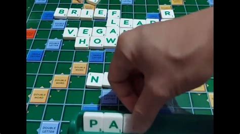 A bingo word in scrabble by taking advantage of the S in qis. - YouTube