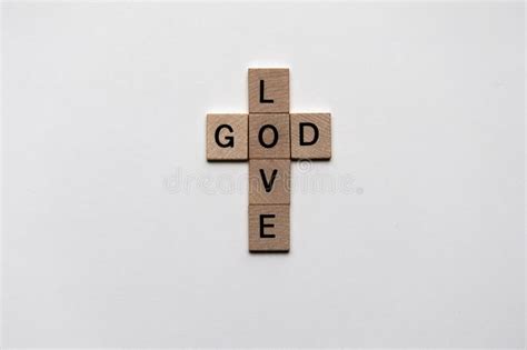 Words of Love and God in Crossword with Wooden Cubes Stock Photo ...