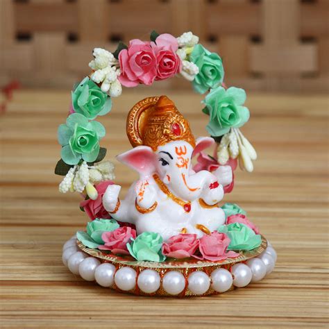 Lord Ganesha With Flowers | Lord Ganesha Idol With Pink & Green Flowers ...