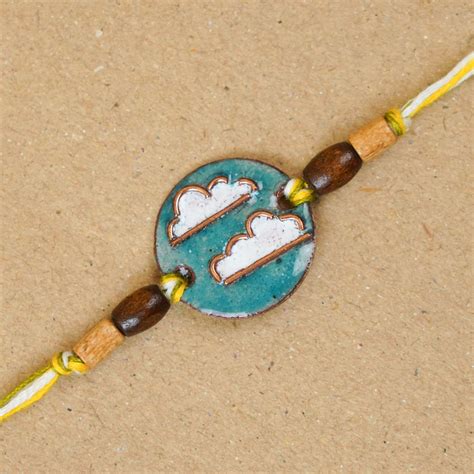 Buy Handmade Baadal Blue Copper Enamel Rakhi With Chocolates & Roli ...