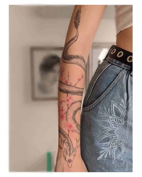 inner arm dragon tattoo