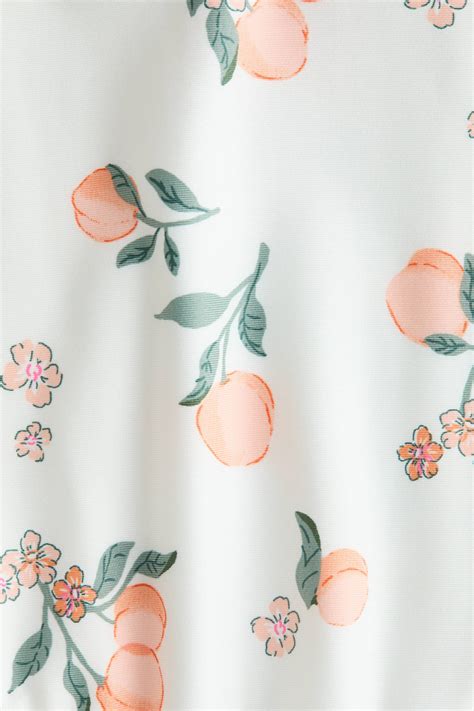 Printed swimsuit - Cream/Peaches - Kids | H&M IN