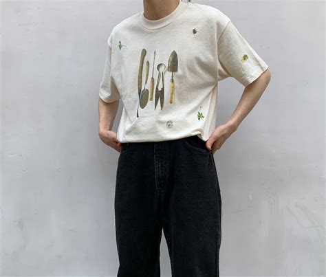 “rel•e•vant products” ©︎1997 multi printed S/S T-shirt | LAUGH