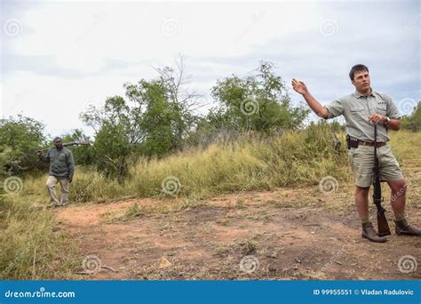 Two Park Rangers Explaining the African Bush Dangers Editorial Photo - Image of africa, water ... - how dangerous is south africa