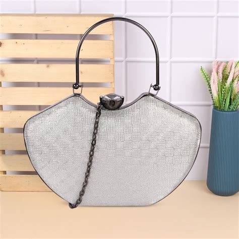 Buy Women Flap Clutch Online In India| Mochi Shoes