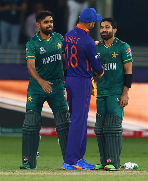 Virat Kohli congratulates Babar Azam and Mohammad Rizwan after the ...