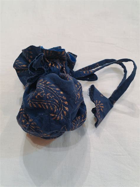 Indigo jewelry pouch - 8 compartments inside with butis patterns ...