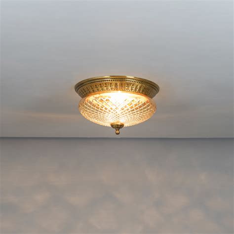 CAMERON 2-Light Flush Mount Ceiling Light in Brass Finish with Amber D ...