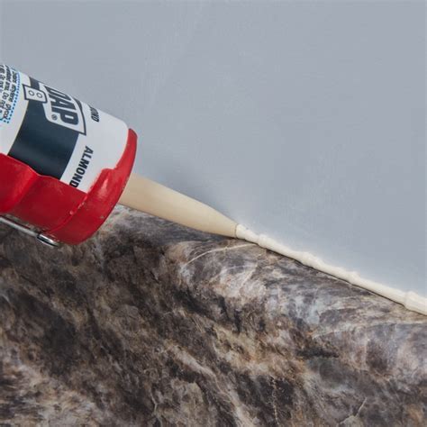 DAP DYNAFLEX 230 10.1-oz Window and Door Almond Paintable Latex Caulk ...