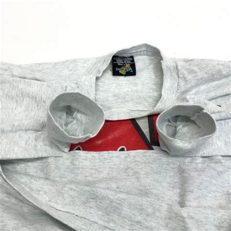 WARNER BROTHERS SPACE JAM 90年代 USA製 NEBRASKA CORN HUSKERS 長袖Tシャツ ロンT ...