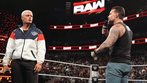 CM Punk & Cody Rhodes share a moment outside the ring during WWE Live ...