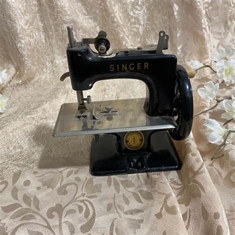 Image result for Singer Mini Sewing Machine
