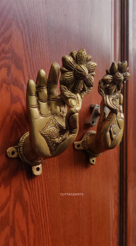 Brass Buddha Hand With Flower Door Handle – CottageArts India