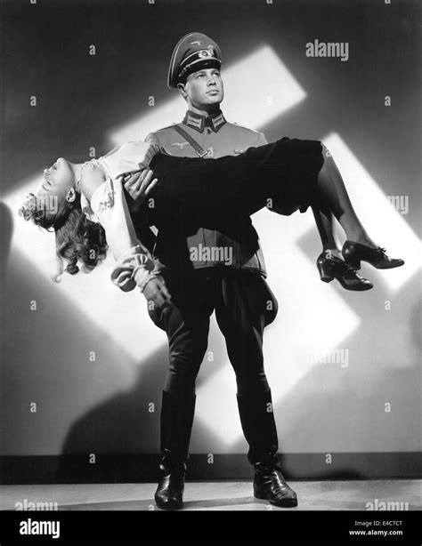 Marsha Hunt, Richard Crane, on-set of the Film, "None Shall Escape ...