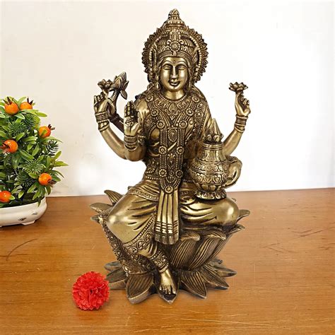 Buy ARTVARKO Goddess Maa Laxmi Idol Brass Statue Sitting in Lotus ...