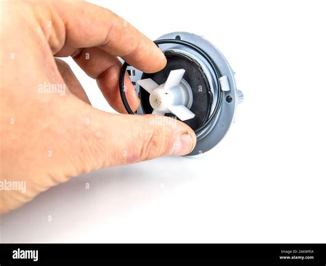 Motor pump with impeller of a washing machine on a white background ...