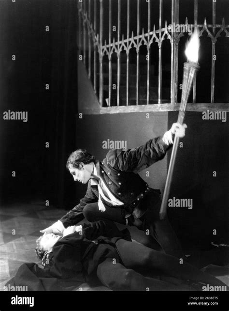 LAURENCE OLIVIER as Romeo and SAM BEAZLEY as Paris in ROMEO AND JULIET play by William ...