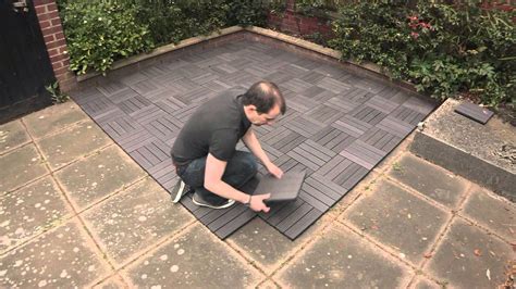 Composite decking tiles on top of a patio | Terrassenböden ...