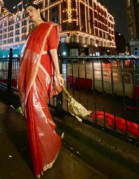 Karisma Kapoor steps out in London in a must-see red Anavila sari ...