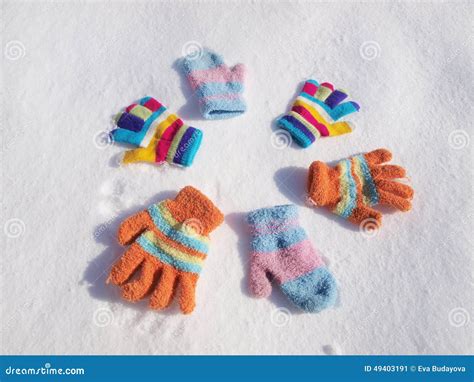 Children Winter Gloves in Snow Stock Image - Image of mitten ...
