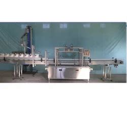 Bottle Filling Machines and Filling Machines Manufacturer | Spheretech ...