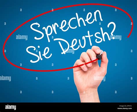 Man Hand writing Do You Speak German? (in German) with black marker on ...